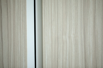 Wood texture Vinyl plank attached to wall.