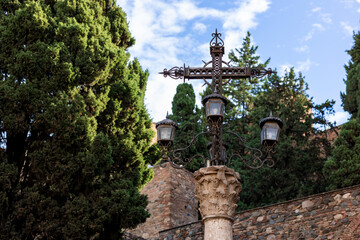 Iron cross next to Alcazaba fortress