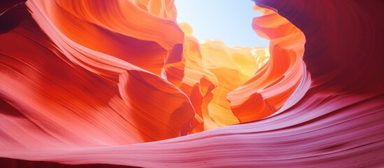 Sandstone canyon under bright blue sky