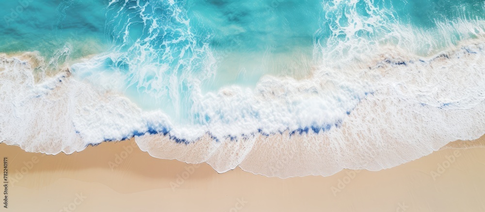 Poster aerial view of a beach with surfboard and wave