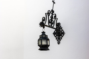 Beautiful detail of iron street lamp