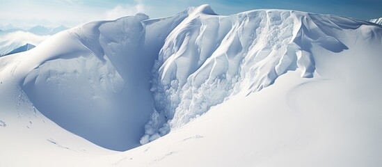 Skiers descend steep snowy mountain under blue sky - Powered by Adobe