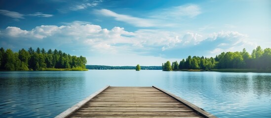 Wooden pier over serene lake