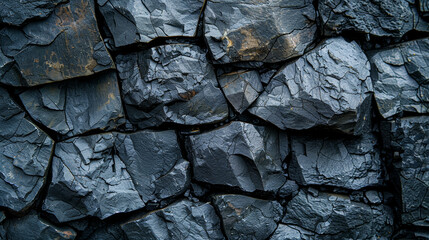 Close-up texture of cracked black stone