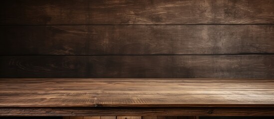 Wooden table on a dark backdrop