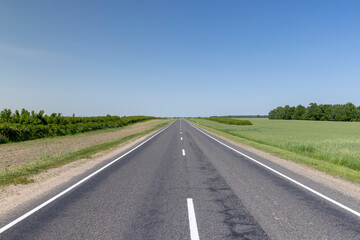 paved road with white line markings
