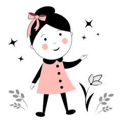 Cute girl in pink coat walking in the garden