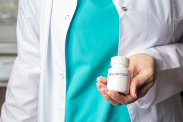 Abortion pills in doctor's hands, medical procedure, reproductive rights, healthcare access