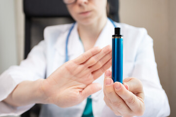 abstinence vape smoking, stop ecigarette, doctor shows a sign of rejection of disposable cigarette...
