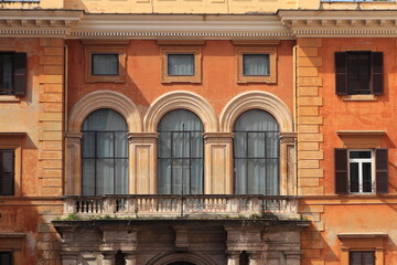 Piazza della Pilotta Square Building Facade Detail with Arched Windows in Rome, Italy