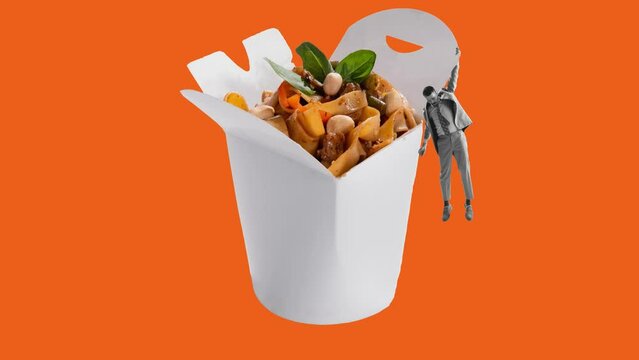 Yummy pasta. Stop motion. Animation. Man holding on box with Chinese noodles, WOK isolated over orange background. Delicious. Concept of Chinese food, taste, artwork. Copy space for ad