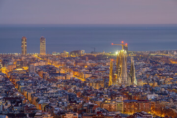The skyline of downtown Barcelona with the Sagrada Familia before sunrise - 782269561