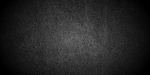 Abstract black stone wall texture grunge rock surface. dark gray background backdrop. wide panoramic banner. old wall stone for dark black distressed grunge background wallpaper rough concrete wall.