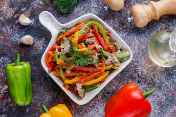 Salad with beef tongue slices and colorful vegetables.