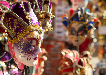Venetian carnival masks for sale at a stall in Piazza San Marco during the festival