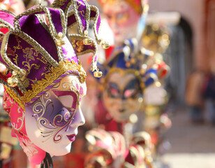 Venetian carnival masks for sale at a stall in Saint Mark Square during the festival