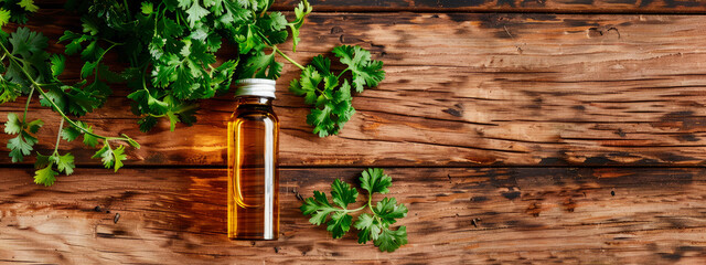 coriander essential oil in a bottle. Selective focus.