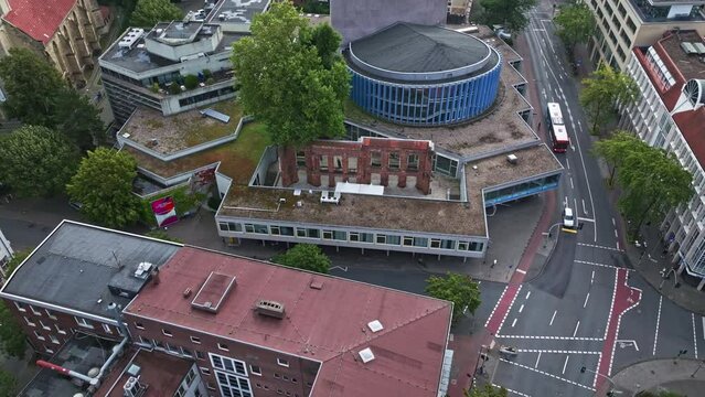 An aerial drone view of Theater M&uuml;nster, a municipal theater in M&uuml;nster, North Rhine-Westphalia, Germany, renowned for its plays and music theatre performances.