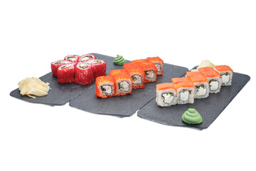 sushi on the black plate isolated on white background with clipping path © Kurganskiy