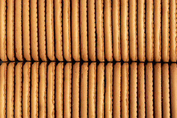 Biscuits background. Close-up of biscuits in a row.