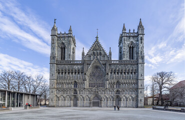 Fototapeta na wymiar Nidaros Cathedral in Trondheim is Norway's most central church in virtue of being Olav the Saint's burial church. Construction work began year 1070, Trøndelag county, Norway 