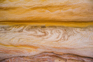 Close up of colors of rocks Australia cliff sandstone Royal National Park