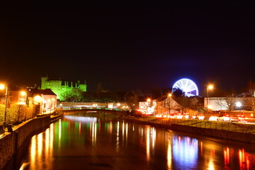 Ferris wheel at night on St. Patrick's Day. Kilkenny, Ireland