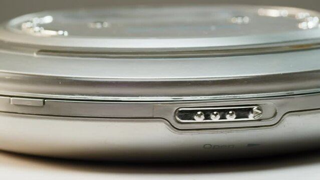 Vintage cd music player close-up. Using portable music player for listening with compact disc