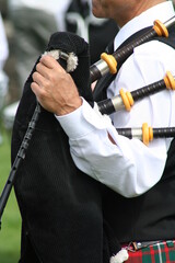 Fototapeta na wymiar man with a bagpipe