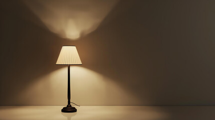 Warm light from a classic table lamp illuminates a blank wall, creating a cozy atmosphere perfect for relaxation or contemplation. - Powered by Adobe