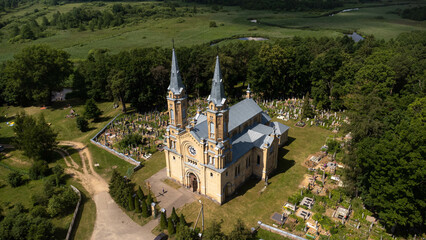 view on the catholic church with cemetery and river on the background from high