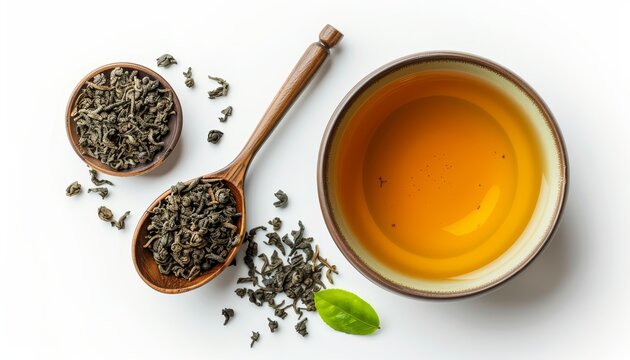 Top view of bio organic chinese green jasmine tea in a ceramic bowl isolated on white