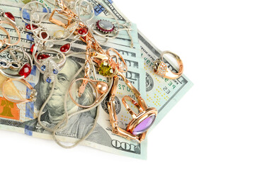American dollars and jewelry isolated on white. There is free space for text.