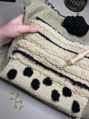 Punch needle wool embroidery black and beige yarn