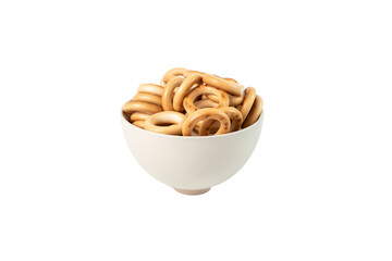 bread rings are laid out in a ceramic bowl on a white background