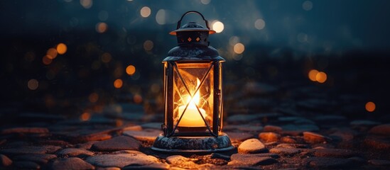 Lantern glows rocky shore water