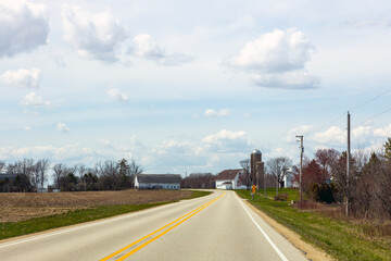 American Country Road With Farm in the Background