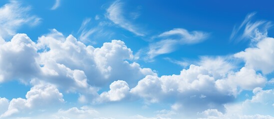 Clouds in expansive blue sky - obrazy, fototapety, plakaty