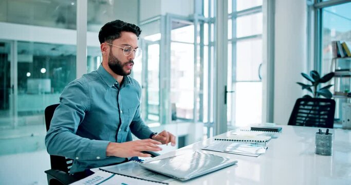 Young businessman, angry and breaking a laptop in office, failure and frustrated for decline in stock assets. Professional trader, rage and vandalism of company property and loss in forex in market