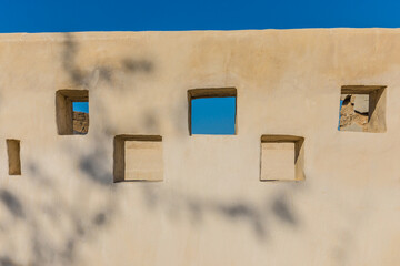The desert coastal town (ghost town) of Jazeera Al Hamra includes a fort, three schools, an...