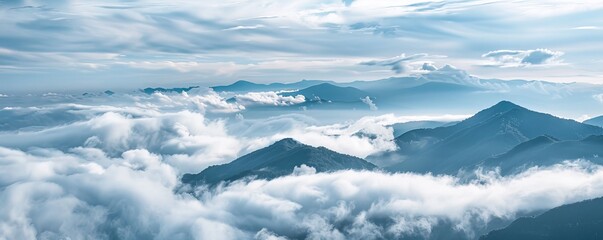 Fototapeta premium mountain peaks above the clouds.