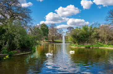 Panorama of the flower garden park pond in the Blackheath village in the spring season in London, Borough of Lewisham, UK