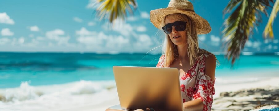 Relaxed female entrepreneur with laptop on sunny beach. Freelance and vacation concept