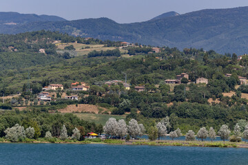 The Bilancino Lake. Lago di Bilancino, Barberino del Mugello, Florence, Italy: landscape at dawn of the picturesque lake in the Tuscan hills