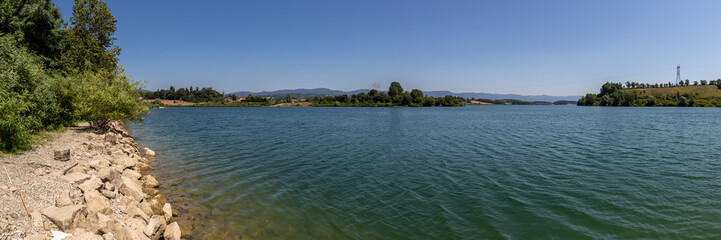 The Bilancino Lake. Lago di Bilancino, Barberino del Mugello, Florence, Italy: landscape at dawn of the picturesque lake in the Tuscan hills