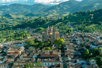 Wide panorama of the superb village (pueblo) of Jerico, antioquia, Colombia, with a blue sky and...