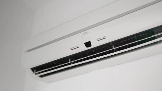 Air conditioner inverter mounted on the wall.