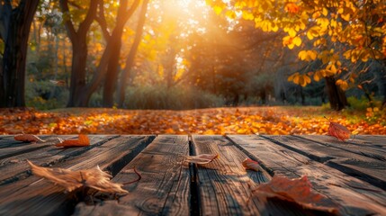 Empty wooden table on the background of autumn garden.