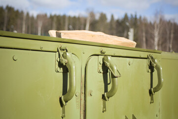Steel box. Handles on the container. Field kitchen.