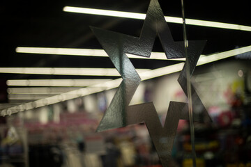 Six-pointed star. Window decoration. Silver star.